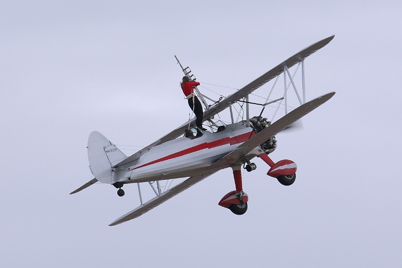 Wing walker on biplane at Miramar air show-1 10-15-06