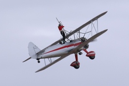 Wing walker on biplane at Miramar air show-1 10-15-06