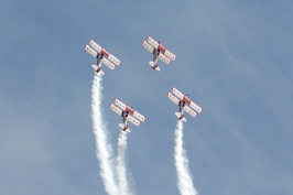 Red Baron aerobatic biplane group in flight at Miramar air show-23 10-12-07
