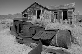 Weathered car and building at Bodie-02bw 6-8-07
