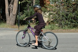 Kady riding bike at Serene Lakes 7-28-07