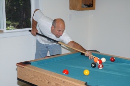 Steve playing pool at Serene Lakes cabin-02 7-28-07