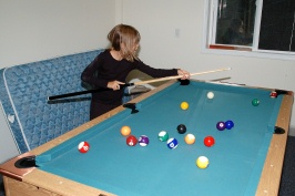 Kady playing pool at Serene Lakes cabin-02 7-28-07