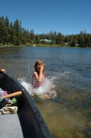 Steve & Kady jumping off canoe in Lake Serena at Serene Lakes-03 7-30-07