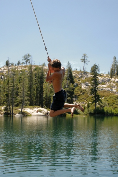 Brett on rope swing at Long Lake near Serene Lakes-10 7-29-07