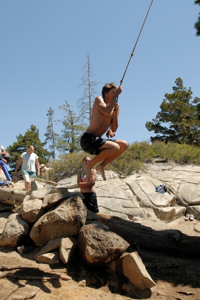 Brett on rope swing at Long Lake near Serene Lakes-14 7-29-07