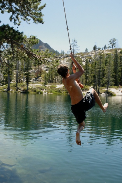 Brett on rope swing at Long Lake near Serene Lakes-17 7-29-07