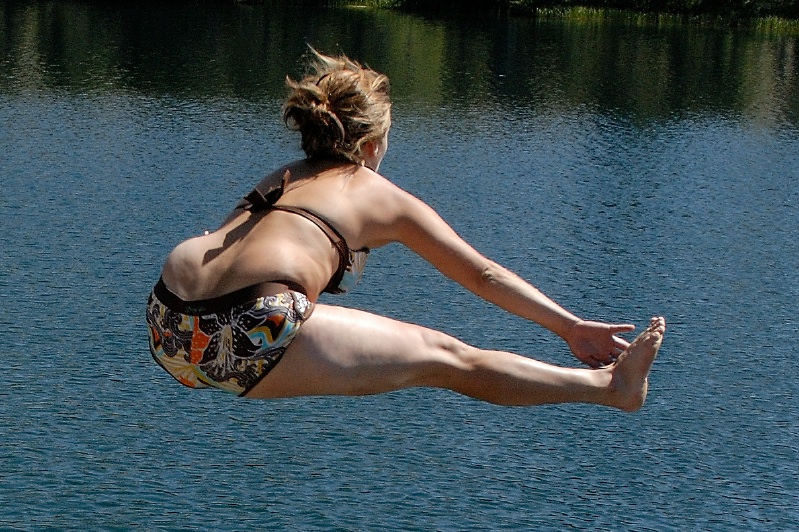 Shannon jumping off rocks into Long Lake near Serene Lakes-01-2 7-29-07