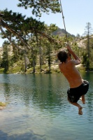 Brett on rope swing at Long Lake near Serene Lakes-09 7-29-07