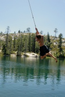 Brett on rope swing at Long Lake near Serene Lakes-18 7-29-07