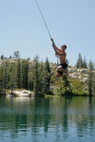 Brett on rope swing at Long Lake near Serene Lakes-19 7-29-07