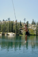 Brett on rope swing at Long Lake near Serene Lakes-21 7-29-07
