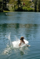 Shannon on rope swing at Long Lake near Serene Lakes-25 7-29-07