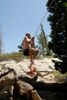 Steve on rope swing at Long Lake near Serene Lakes-09 7-29-07