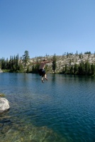 Brett jumping off rock into Long Lake near Serene Lakes-03 7-29-07