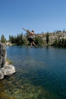 Brett jumping off rock into Long Lake near Serene Lakes-08 7-29-07