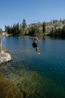 Brett jumping off rock into Long Lake near Serene Lakes-15 7-29-07