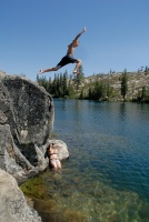 Shannon photographing Brett jumping off rock into Long Lake near Serene Lakes-01 7-29-07