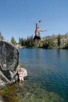 Shannon photographing Brett jumping off rock into Long Lake near Serene Lakes-06 7-29-07