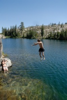 Shannon photographing Brett jumping off rock into Long Lake near Serene Lakes-08 7-29-07