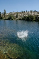 Shannon photographing Brett jumping off rock into Long Lake near Serene Lakes-10 7-29-07