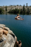 Shannon jumping off rocks into Long Lake near Serene Lakes-01 7-29-07