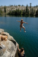 Shannon jumping off rocks into Long Lake near Serene Lakes-02 7-29-07