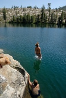Shannon jumping off rocks into Long Lake near Serene Lakes-03 7-29-07