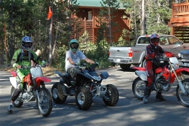Brett BDL GL setting off on dirt bikes at Serene Lakes cabin-03-d 7-31-07