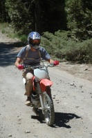 Craig Martens riding dirt bike down old Soda Springs Rd near Serene Lakes-13 8-5-07