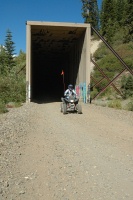 LC riding ATV through snow sheds at Donner Pass-03 8-8-07
