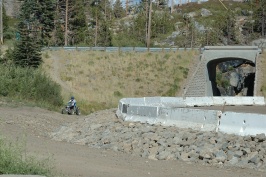 LC riding ATV at entrance to snow sheds at Donner Pass-01 8-8-07
