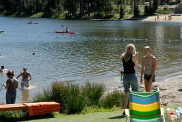 Tammy watching Haley complete swim in family triathalon at Serene Lakes 7-29-07