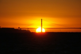Sun setting behind Goldern Gate Bridge 12-81
