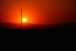 Sun setting near Coalinga CA 5-83