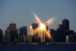 Dawn sun on buildings in SF from YBI 1-84