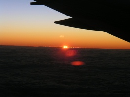 Sun rising from flight from Cairns to Brisbane AU 7-6-03