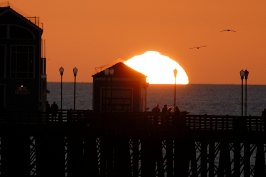 Sun setting behind Oceanside pier-22 10-11-06