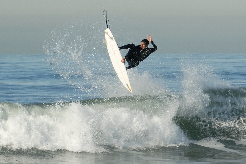 Surfer at Tamarack beach in Carlsbad-19 12-14-06