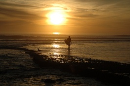 Surfer at sunset at Swamis in Encinitas-29 2-17-07